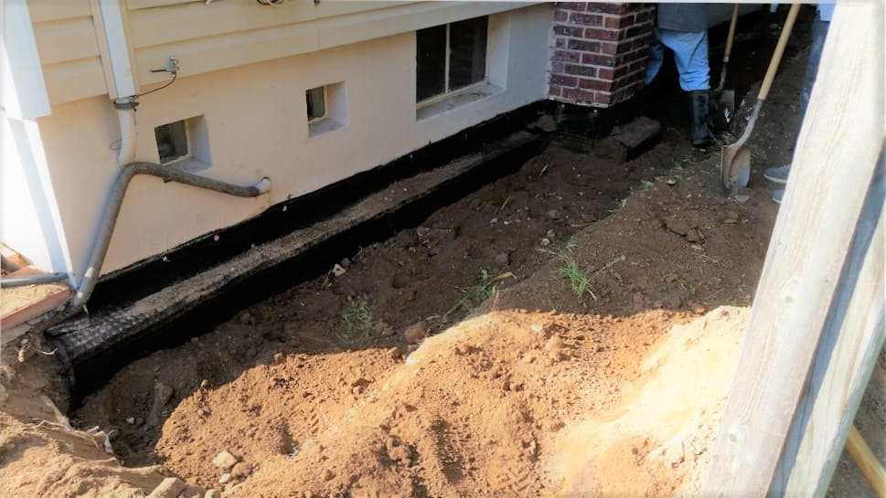 Basement wall waterproofing